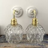 Pair of chiseled glass wall sconces
