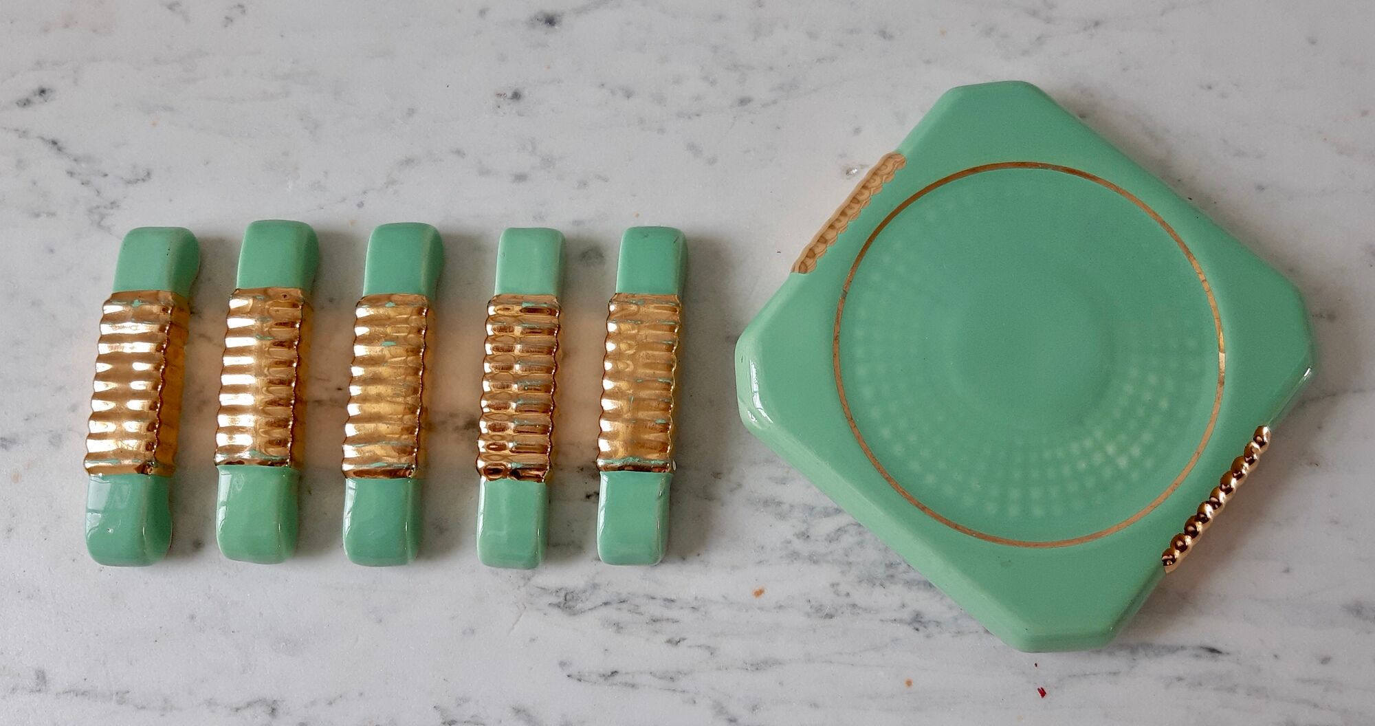 Set of a bottle bottom and 5 knife holders in art deco mint green ceramic