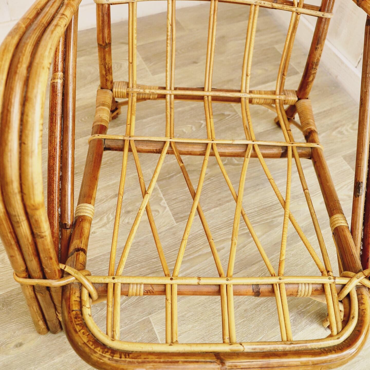 Pair of rattan chairs Audoux & Minnet 1960