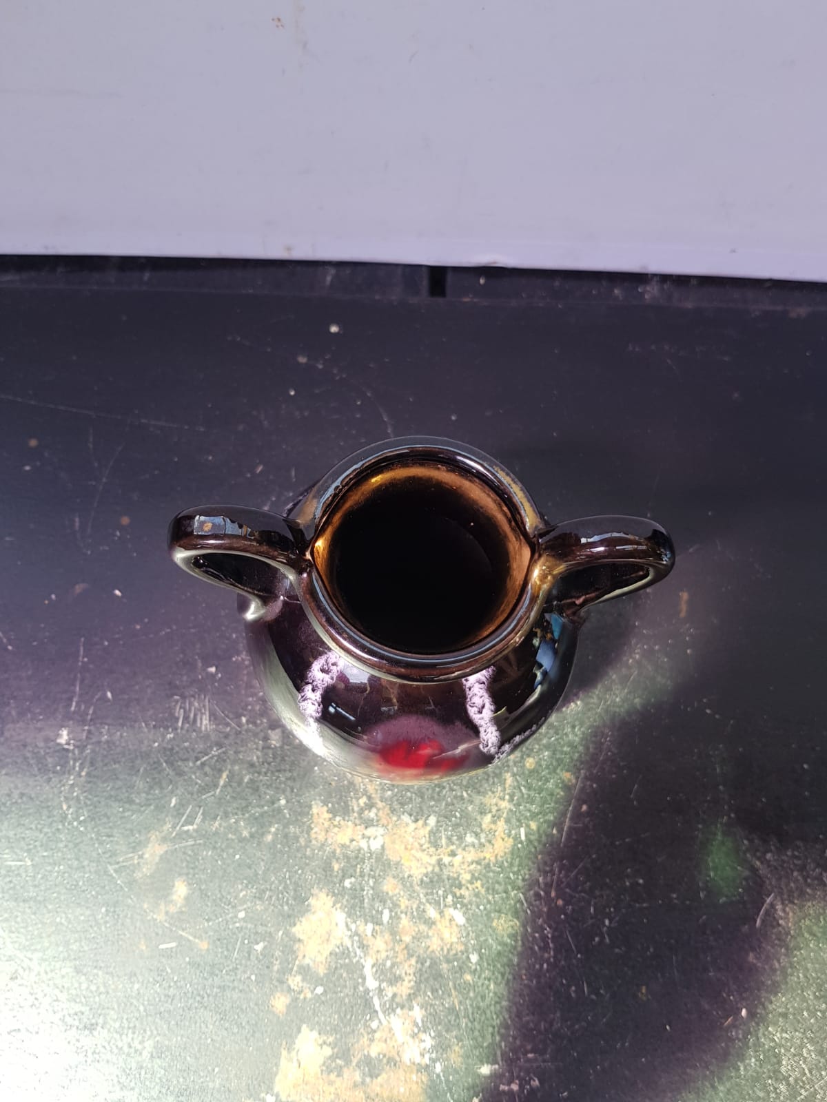 Old vase with coves ceramic black