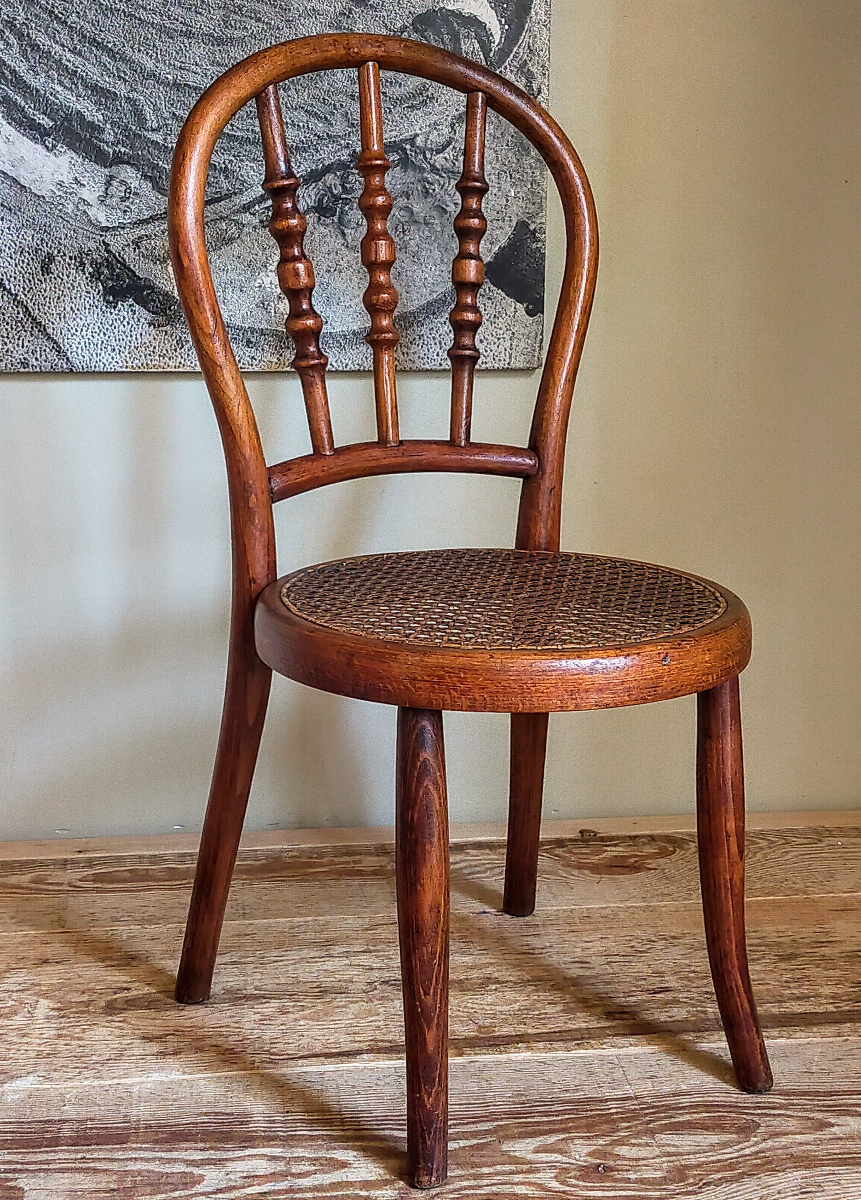 Children's chair in curved round wood old year