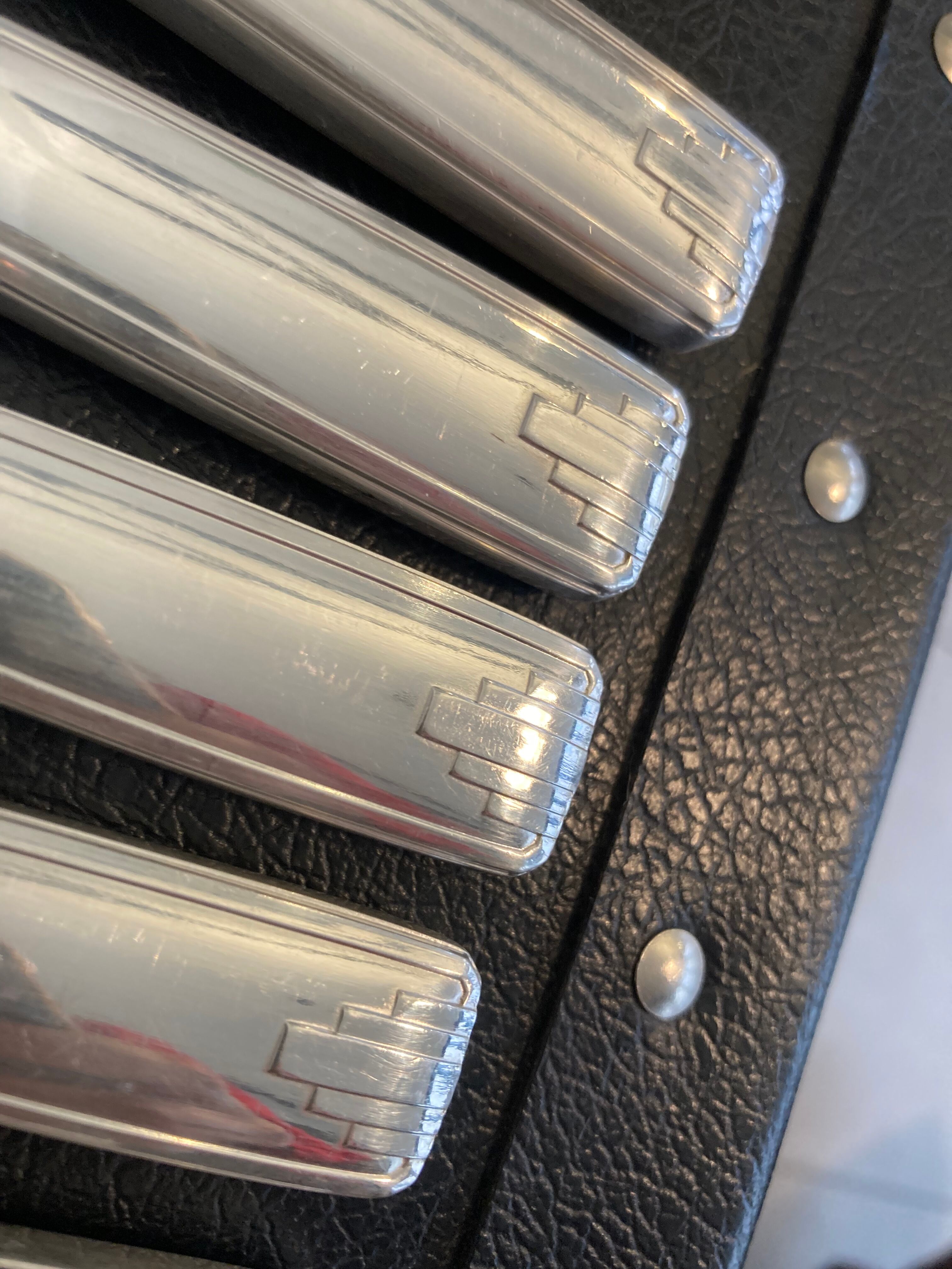 Set of 24 silver metal knives art deco