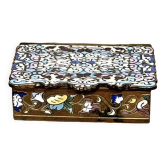 brass pillbox and enamel floral motifs