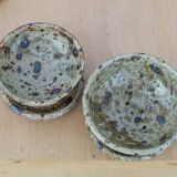 Pair of vergy speckled sandstone candle holders, vintage