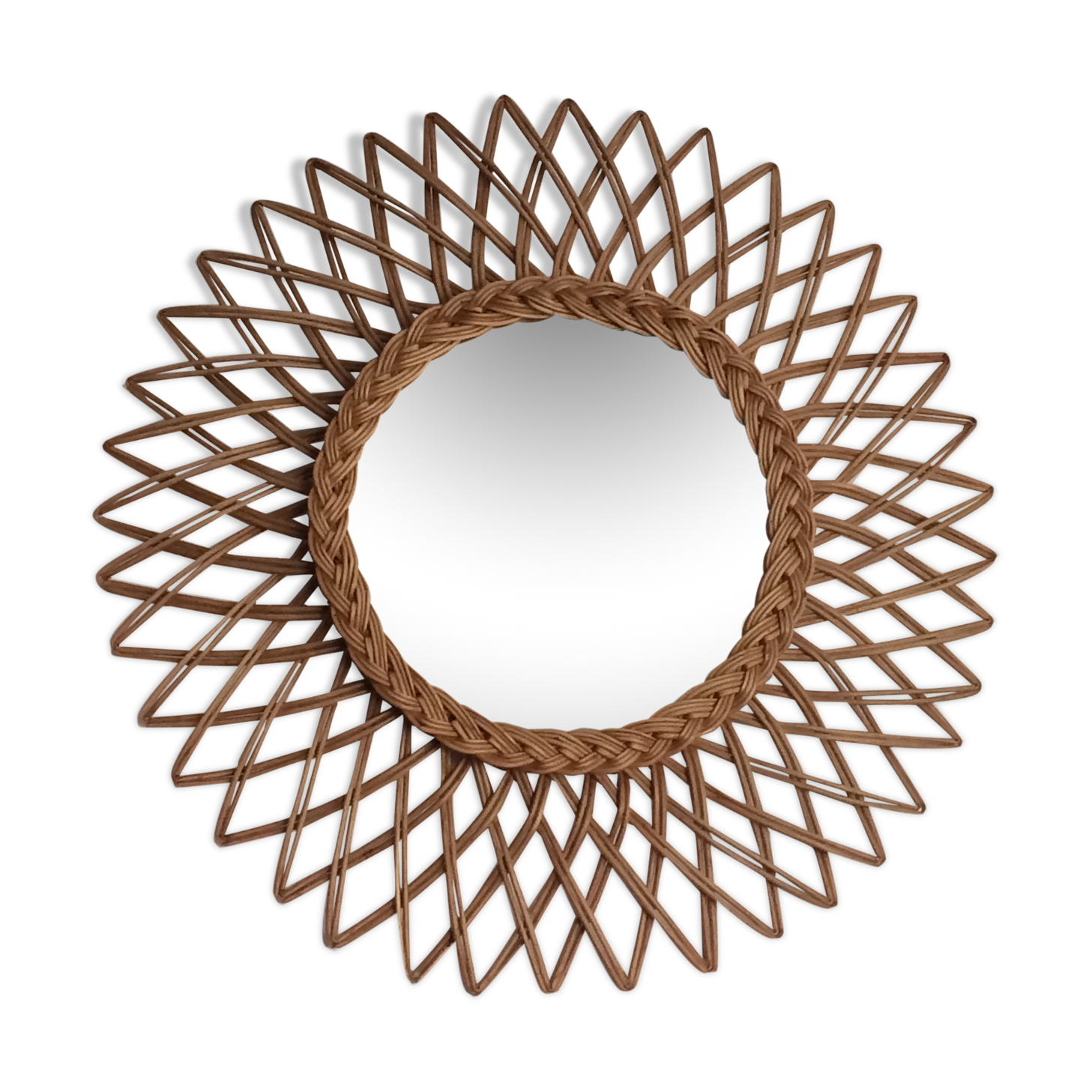 Sun mirror in braided rattan. 1960. 52cm.