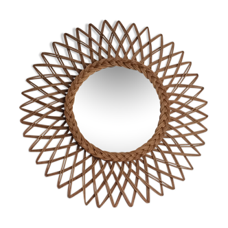 Sun mirror in braided rattan. 1960. 52cm.