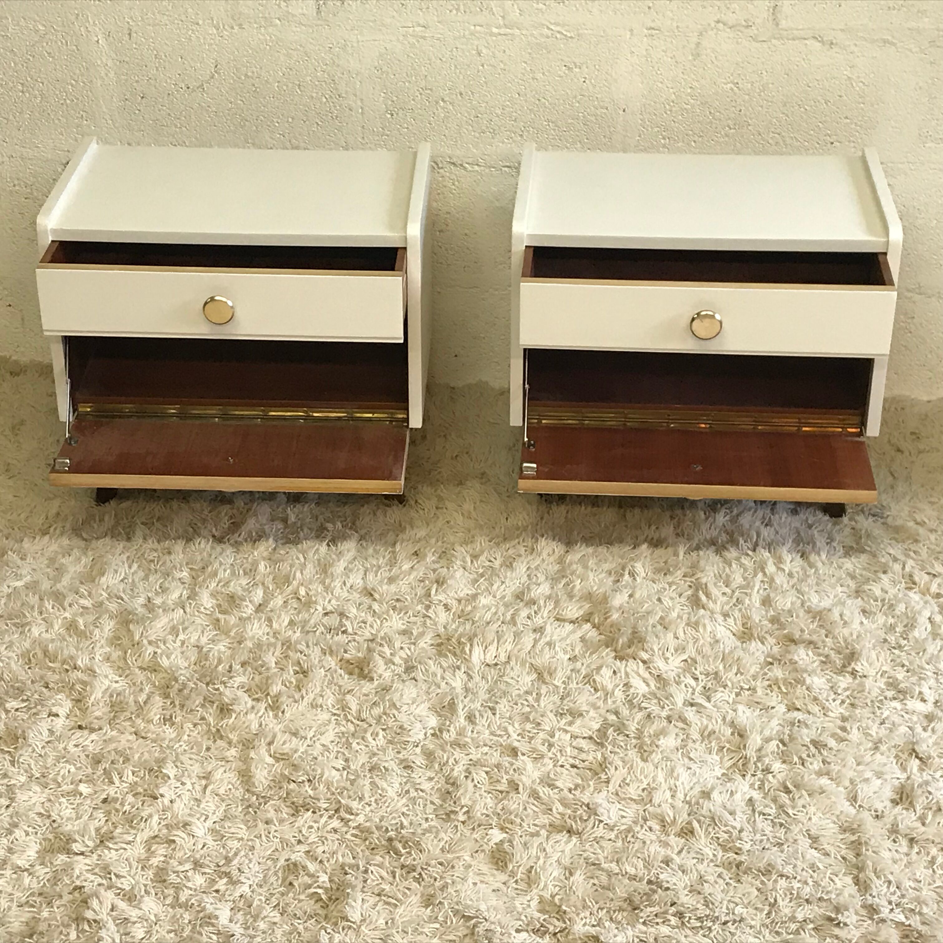Pair of bedside tables with compass feet