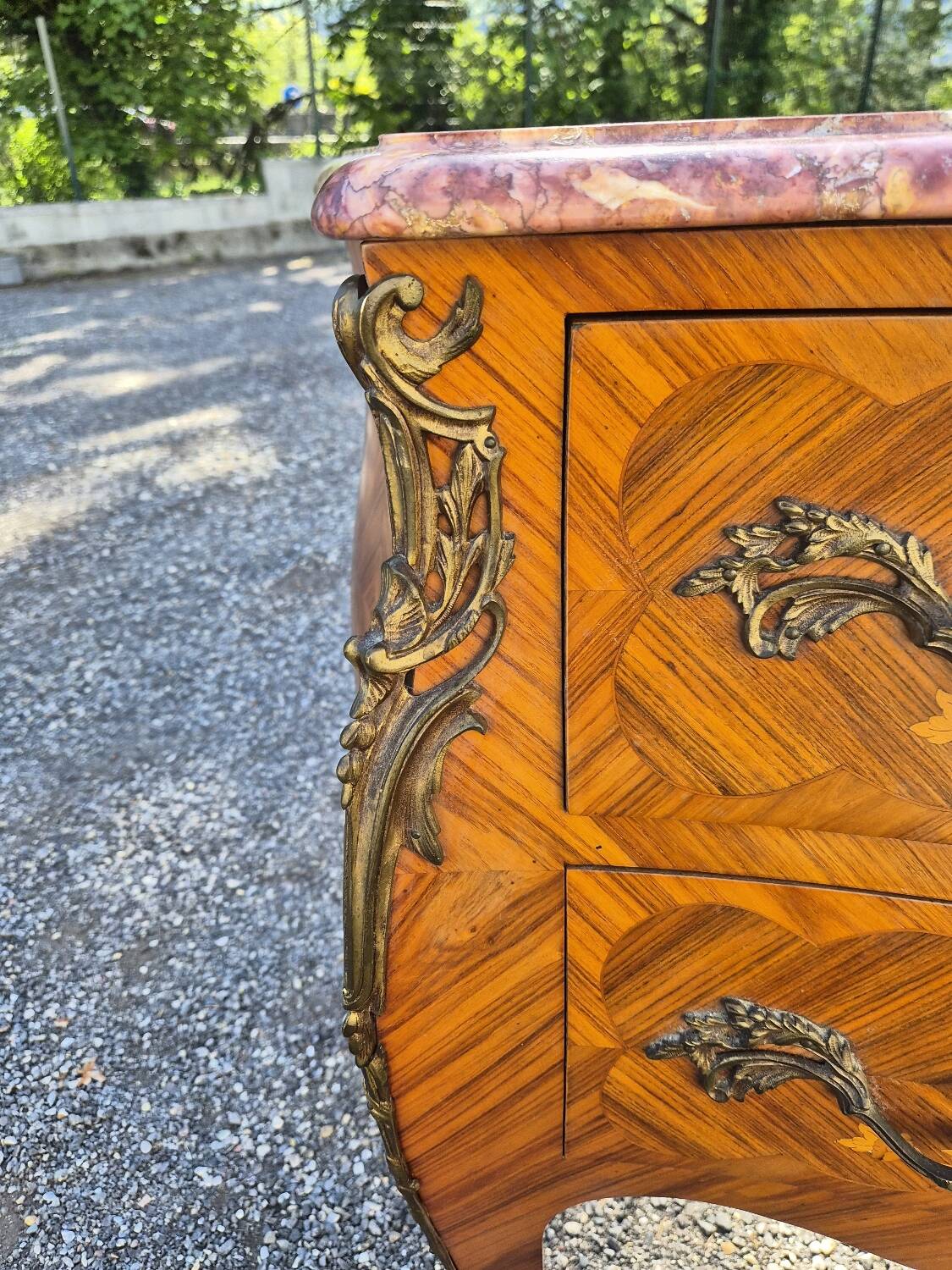 Louis XV style jump commode with marquetry and marble decoration.