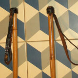 Old pair of ski reed leather stick