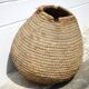 Old basket, burgundy straw and bramble, woven basket, interior decoration, pantry, flowerpot