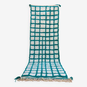 Moroccan hallway rug with inverted pine green and white checkerboard