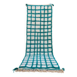 Moroccan hallway rug with inverted pine green and white checkerboard