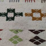 Handmade rugs in natural wool with traditional patterns