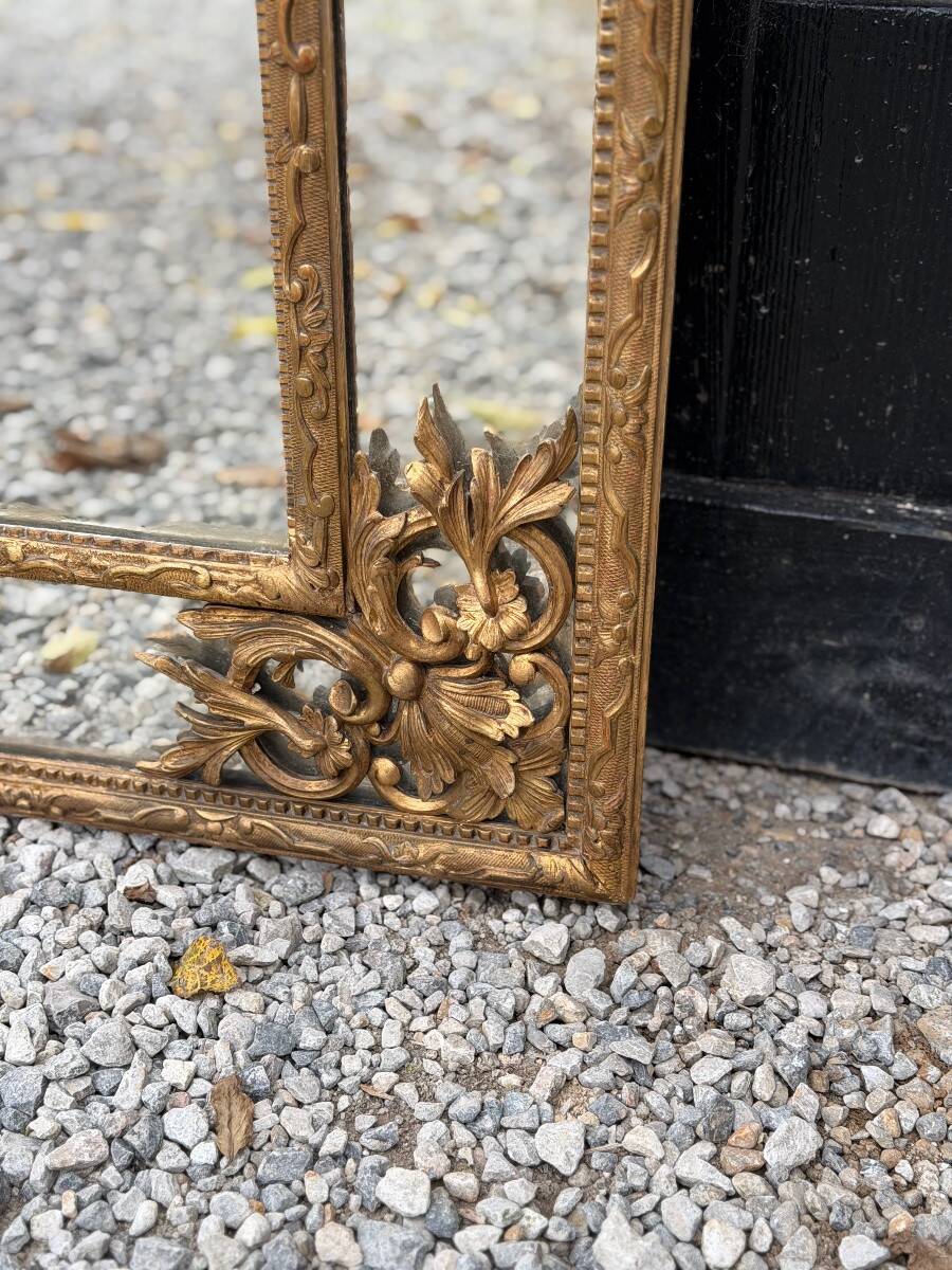 Regency style mirror in gilded wood, 19th century