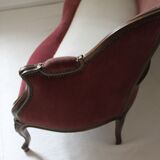 Faded pink velvet sofa