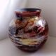 Lacquered glass ball vase by Jean Noel Bouillet