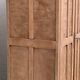 Armoire parisienne panneautée en bois brut, 1930