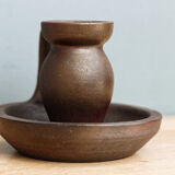 Small hand-held candlestick, signed