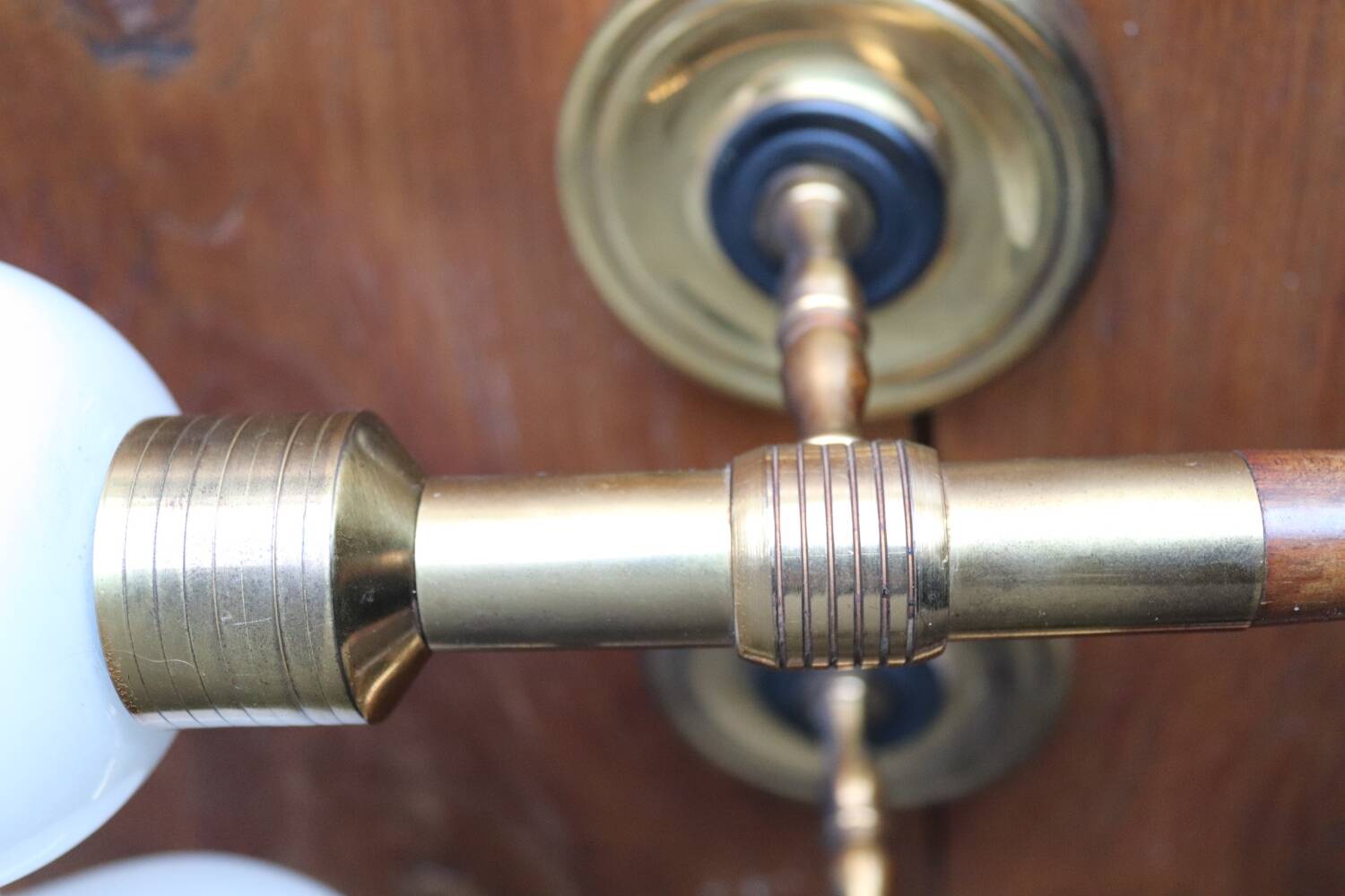 Pair of vintage Lunel house wood and brass wall lights