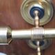 Pair of vintage Lunel house wood and brass wall lights