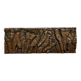 Central Africa 20th century: carved wooden panel in bas-relief of elephants