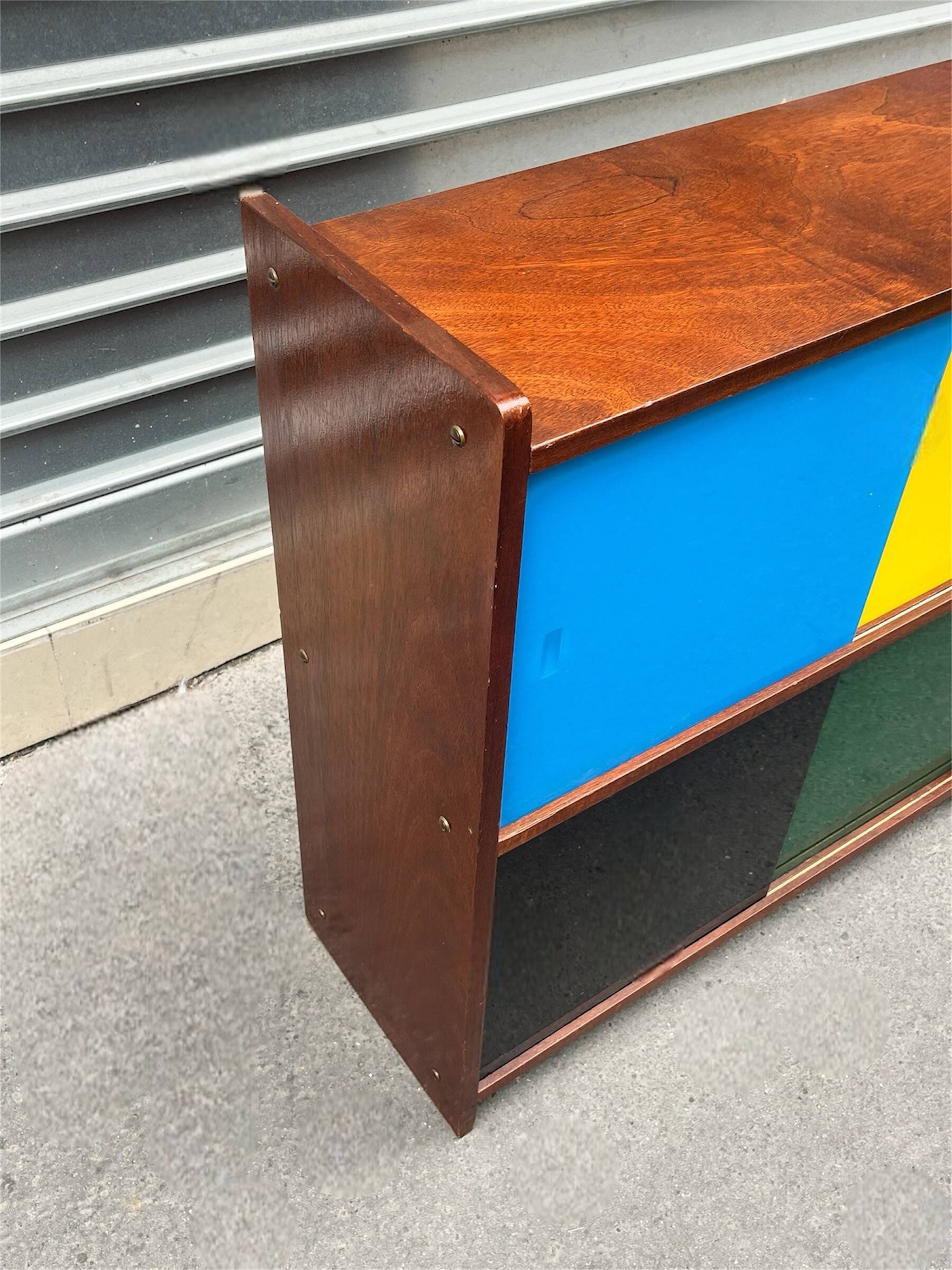 Closed bookcase in Bauhaus colors by D.Rozaffy Edition Meuble Oscar, design 1960