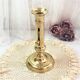 Gilded copper push candle holder
