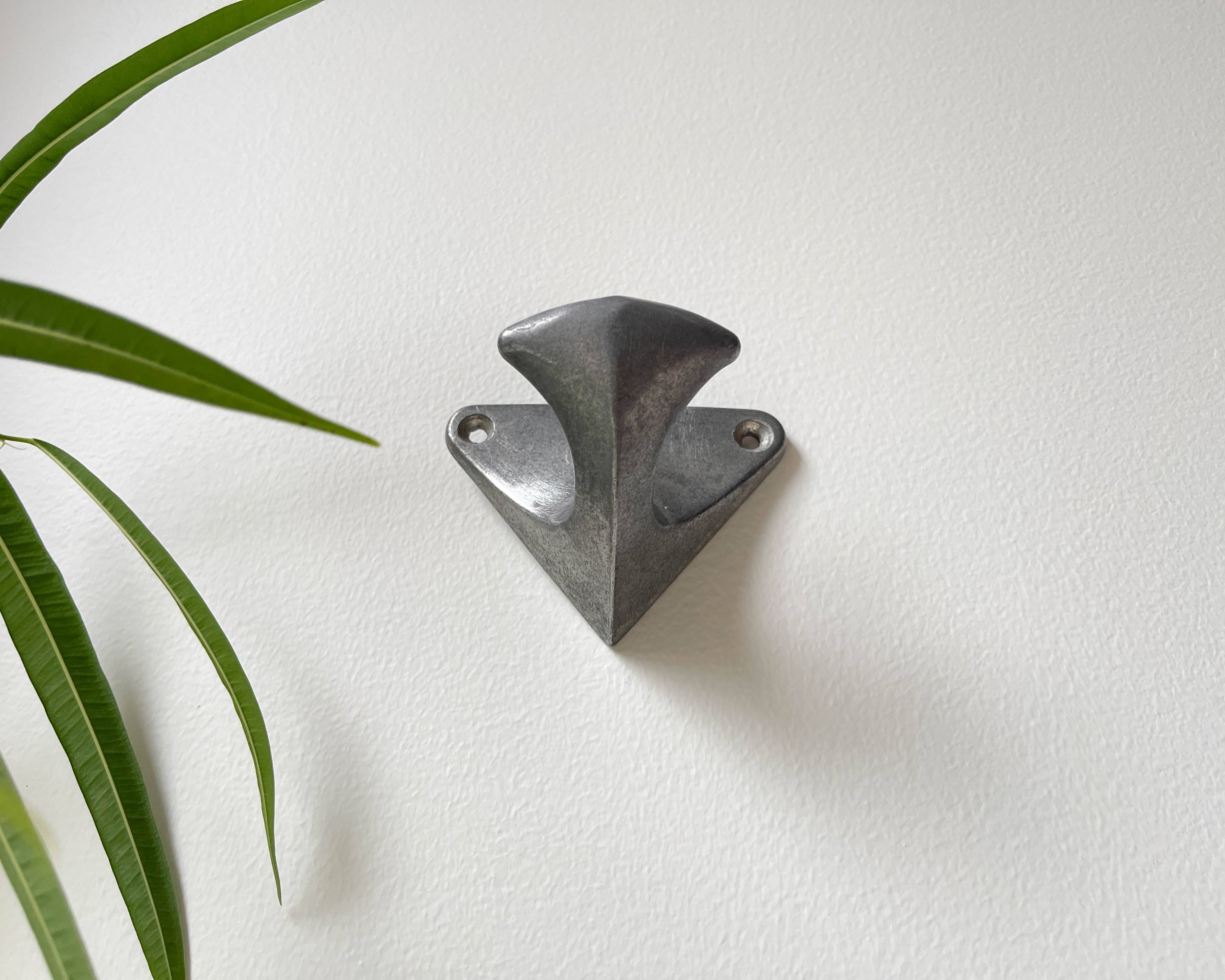 Vintage cast aluminum wall hooks