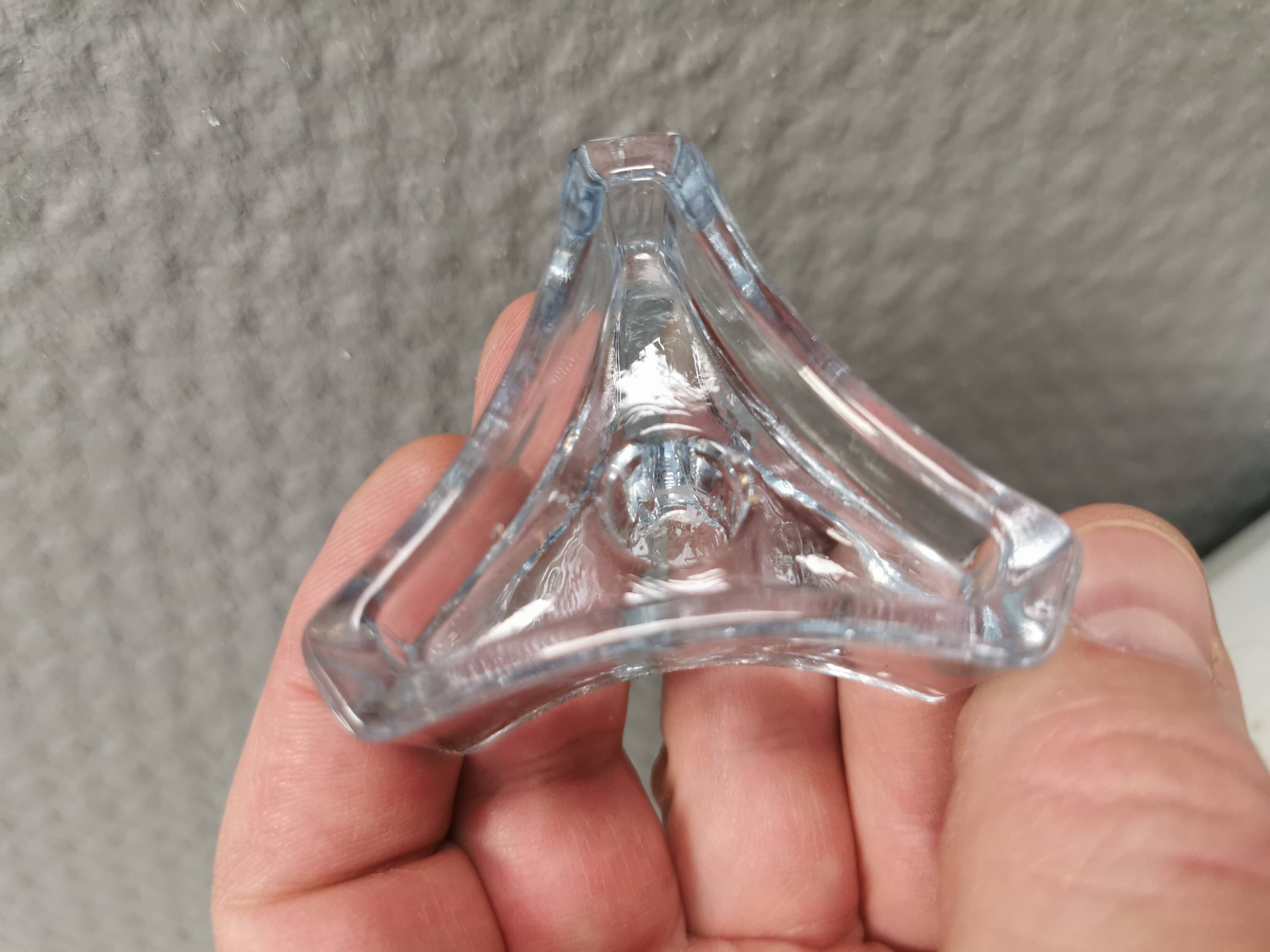 Two beautiful glass candle holders in translucent bluish glass.
