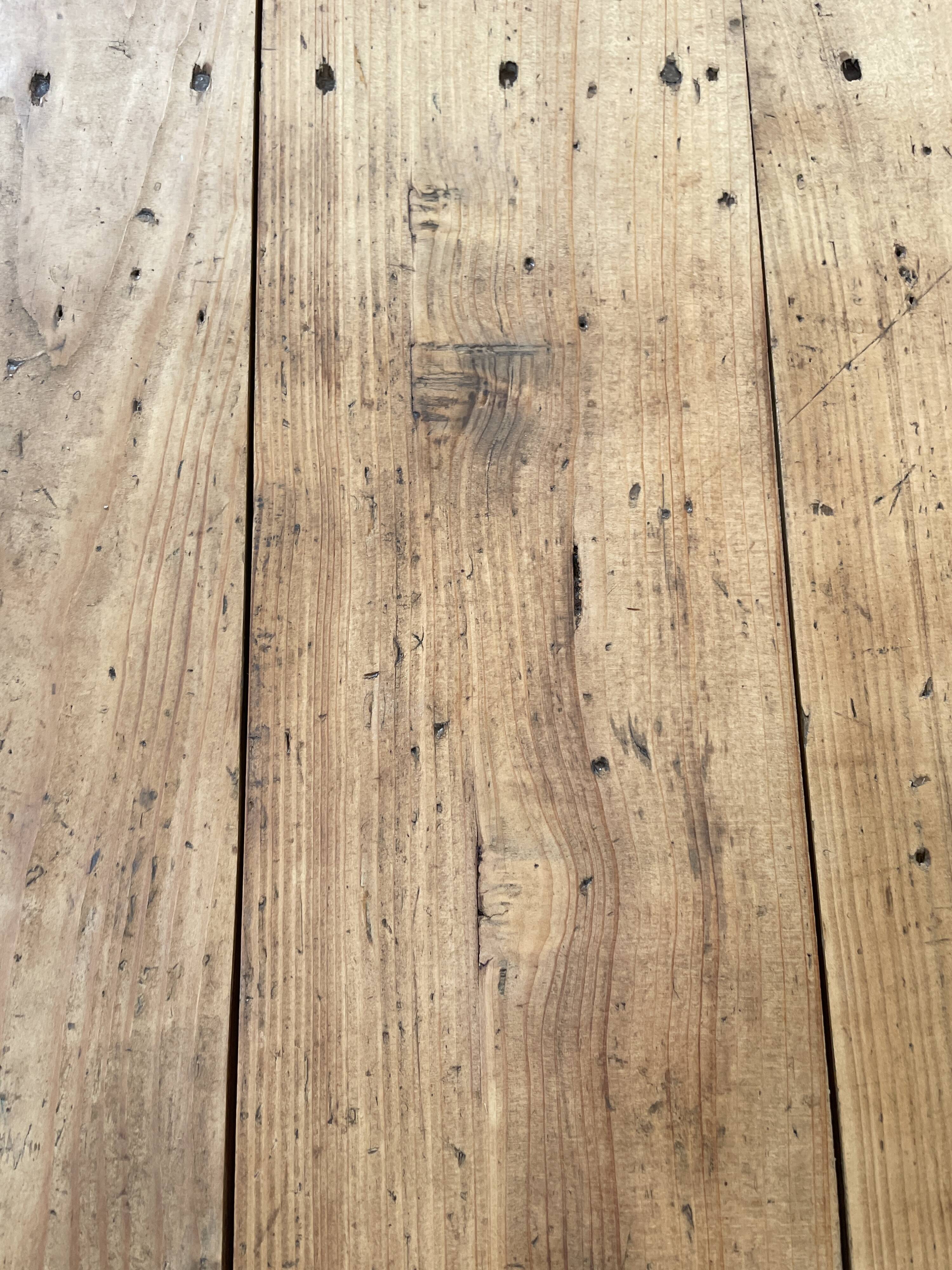 Solid wood workshop table with straight legs.