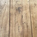 Solid wood workshop table with straight legs.