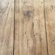 Solid wood workshop table with straight legs.