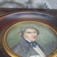 Miniature portrait of a man in a wooden frame