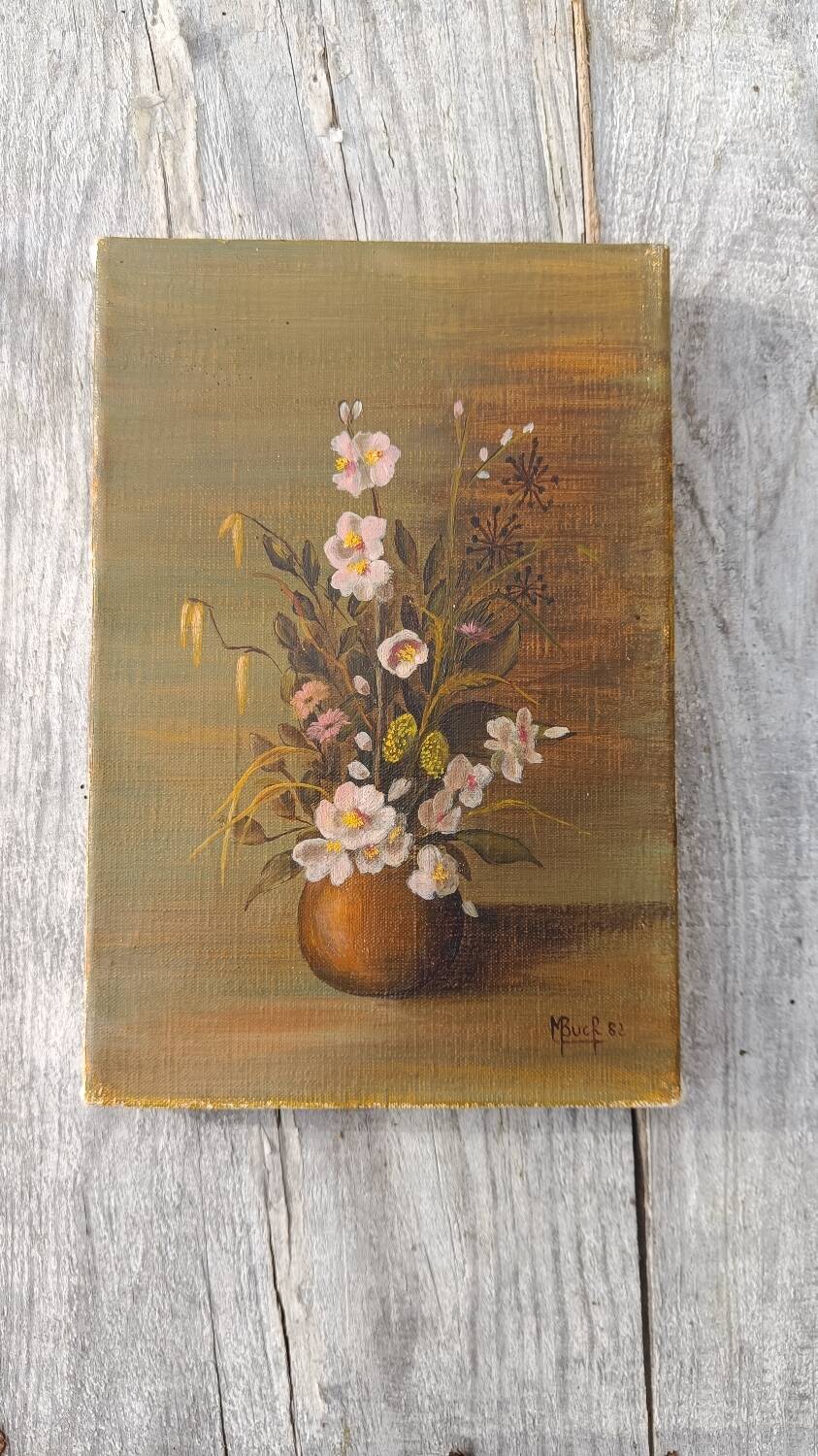 Canvas painting of a bouquet of flowers.