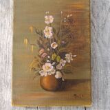 Canvas painting of a bouquet of flowers.