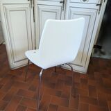 White plexiglass chair