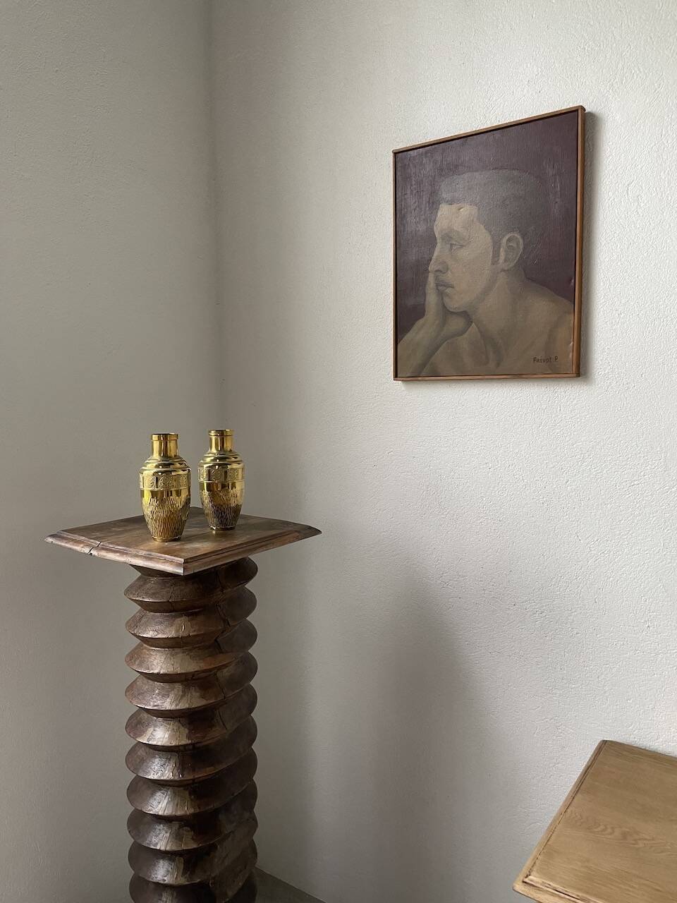 Duo of embossed brass vases