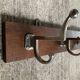 Wall coat rack from the 1950s-60s in solid oak and stainless steel.