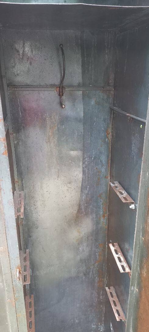 Very old riveted 5-door locker room