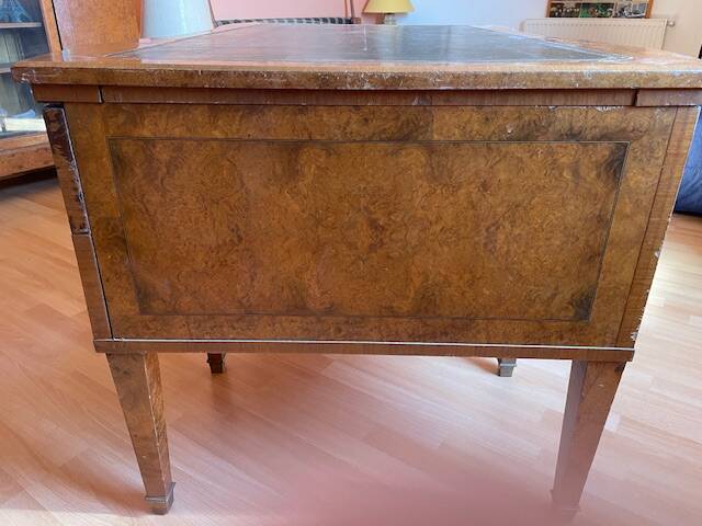 Antique Empire-style desk in burr veneer, green leather, with a dash.