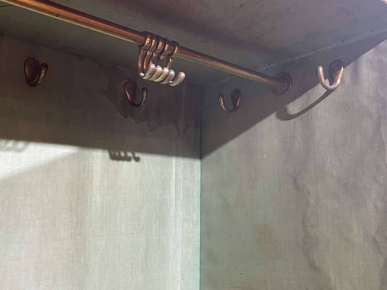 19th-century English mahogany three-door wardrobe.