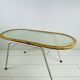 Vintage rattan and glass table with 70s steel frame