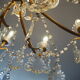 Chandelier 12 lamps with grapevines in crystal, bronze and regulated