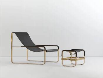 Footrest in aged brass and black leather, modern style, wanderlust