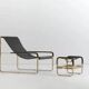 Footrest in aged brass and black leather, modern style, wanderlust