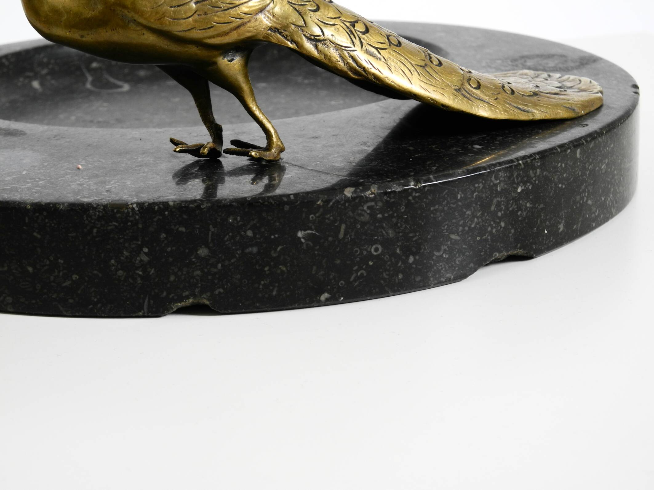 Beautiful, large black granite valet tray featuring a brass peacock, circa