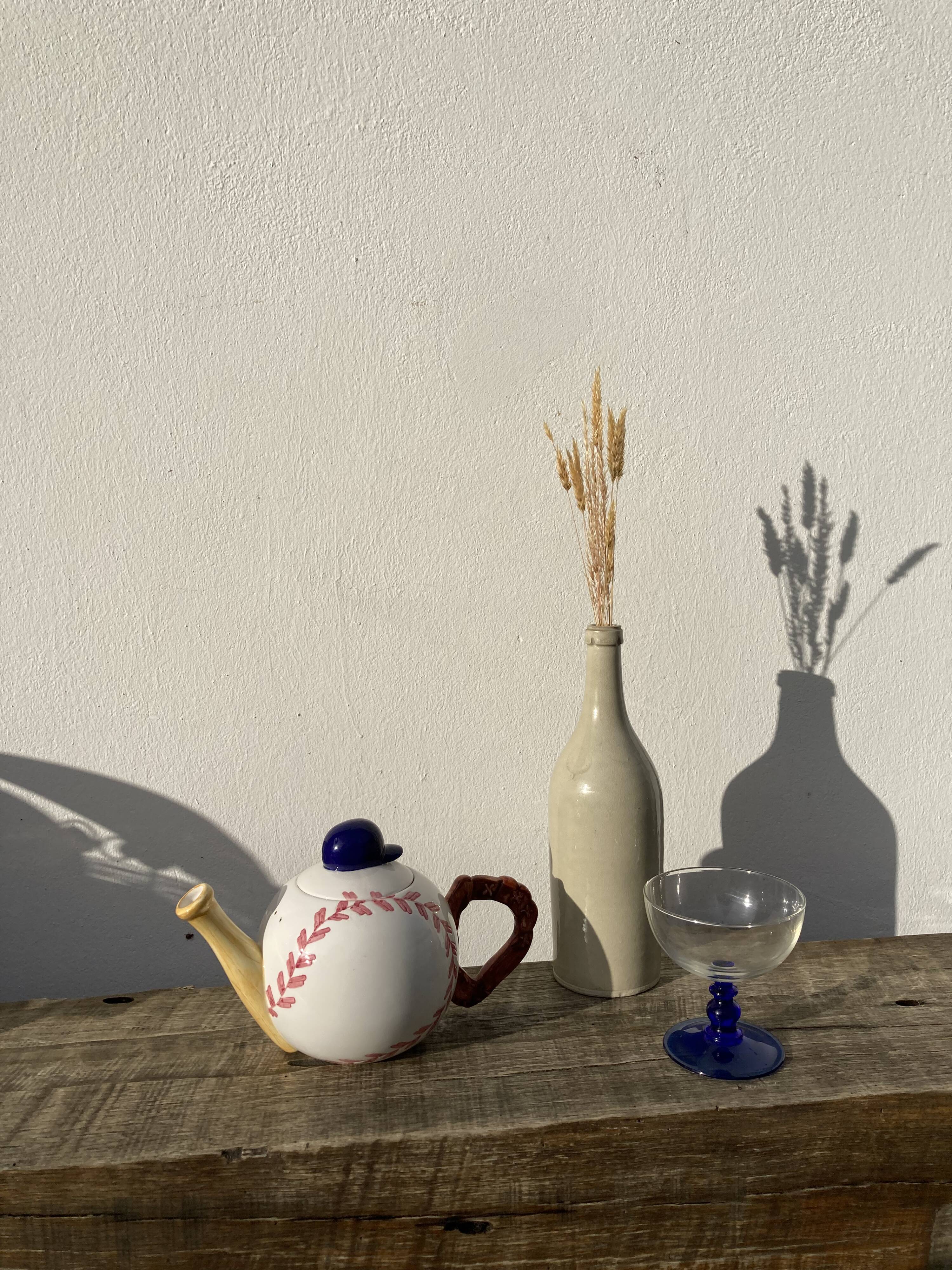 Teapot in white ceramic baseball