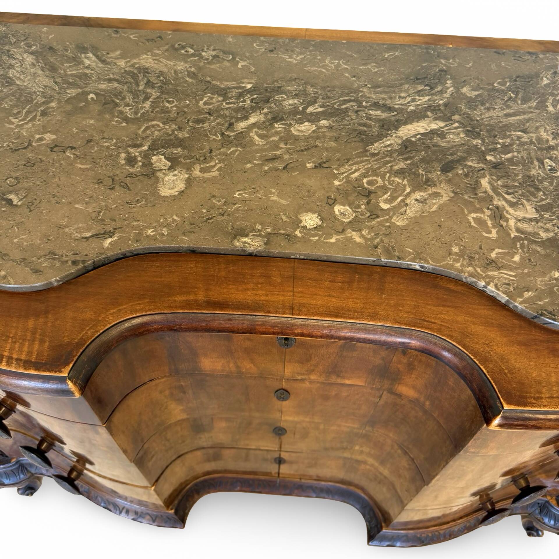 serpentine commode in antique walnut