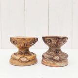 Pair of anthropomorphic egg cups by Jacques Pouchain