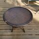 Round vintage coffee table in bombous and rattan